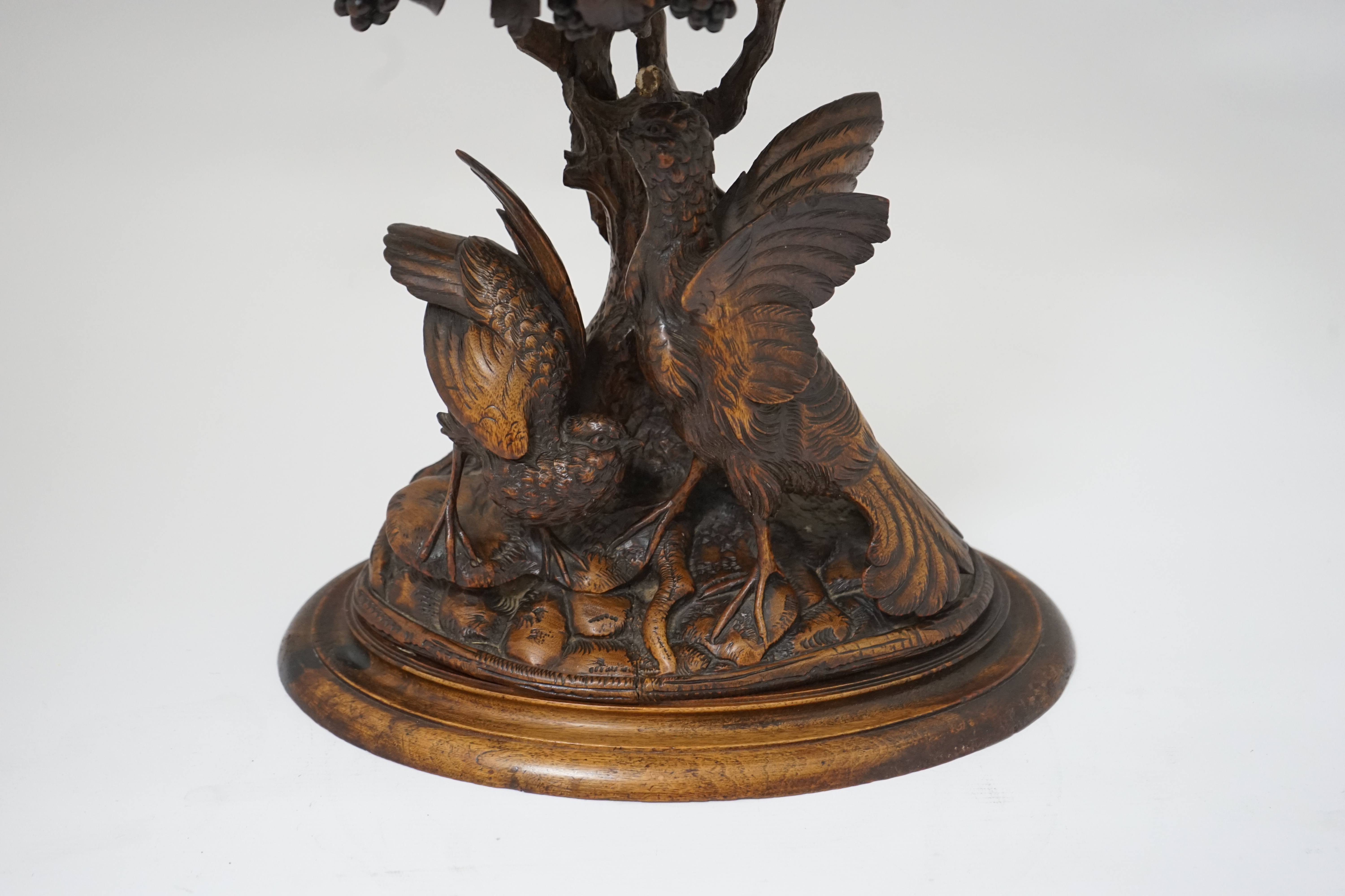 A 19th century Black Forest carved wood centrepiece